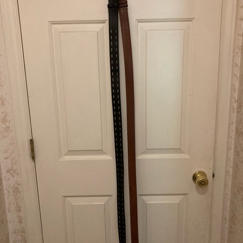 Men’s dress belts, 2 pack new belts. 1 brown, 1 black.you’re getting 2 belts